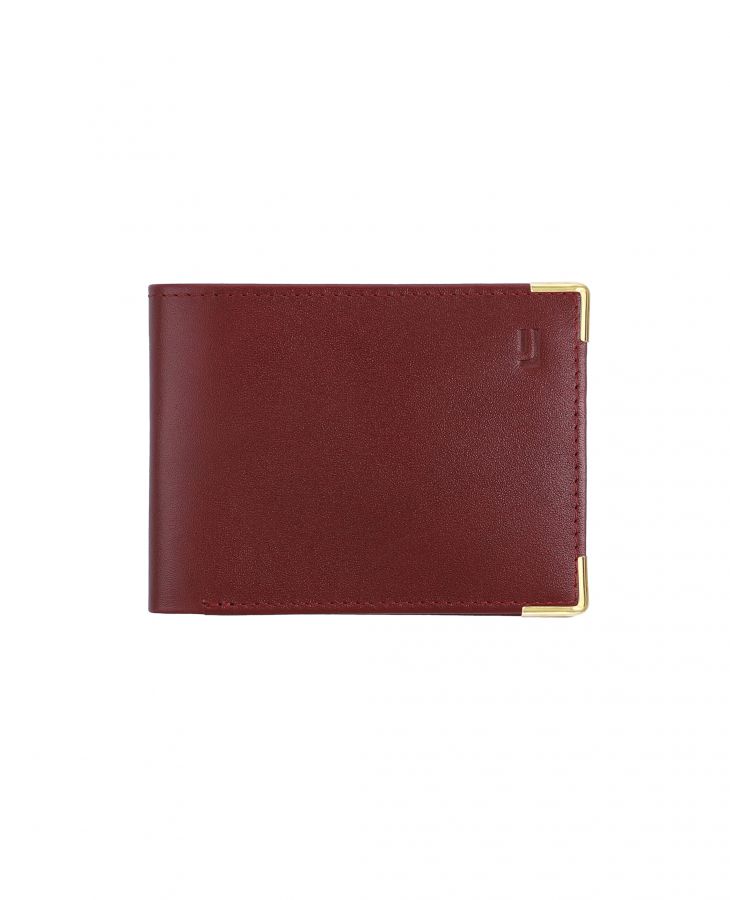 Handcrafted leather wallet with gold accents.