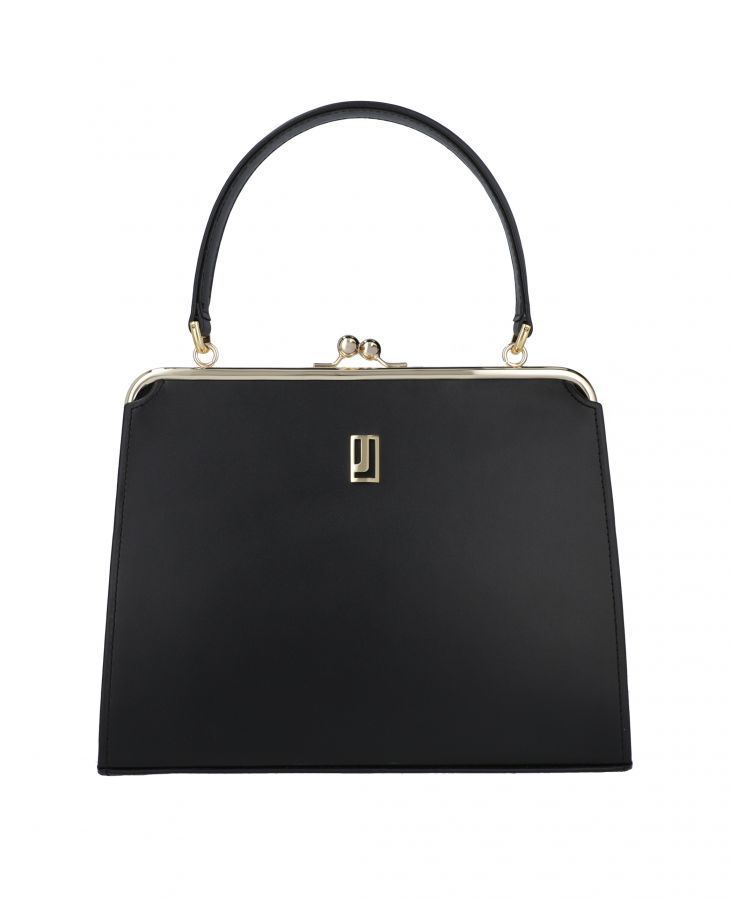 Black  handbag, a symbol of elegance and legacy.