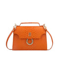 Sophisticated leather handbag with flap.