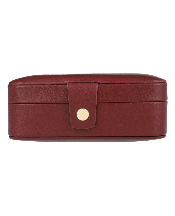 Compact jewelry case with snap button closure and removable tray.